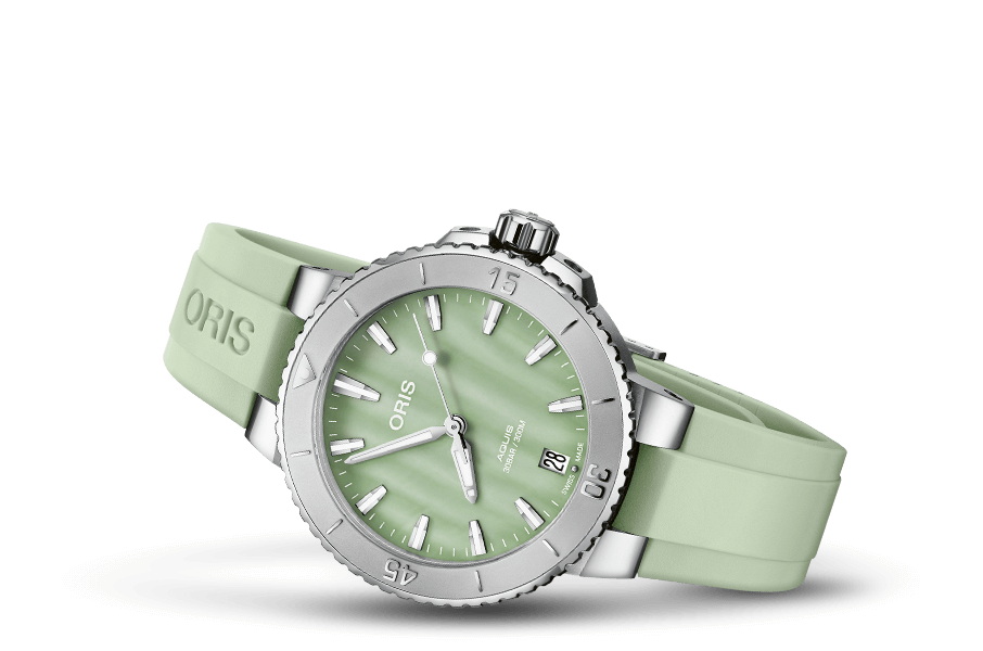 Oris Dameshorloge 36,5 mm met mintgroene wijzerplaat en siliconen band. Stijlvolle tijdwaarneming met Swiss Made precisie en 30 bar waterdichtheid.