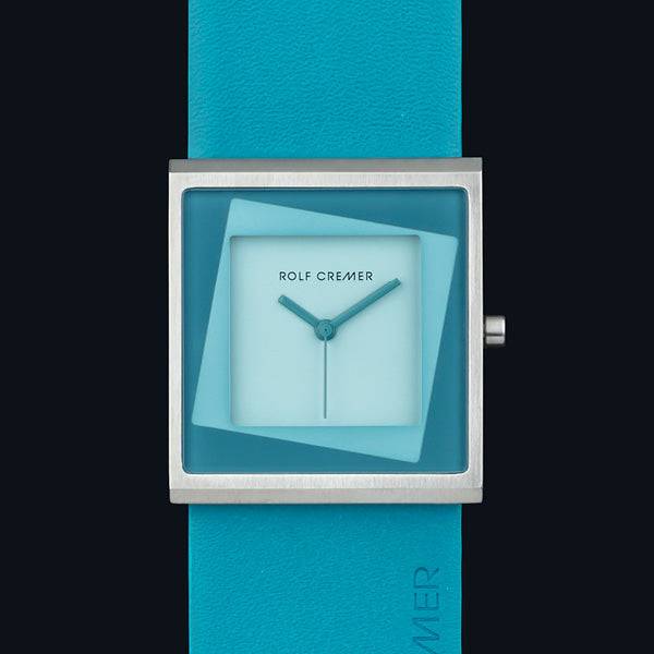 Rolf Cremer Yess dameshorloge 34mm met vierkante kast en turquoise leren band. Stijlvol en tijdloos design voor moderne vrouwen.